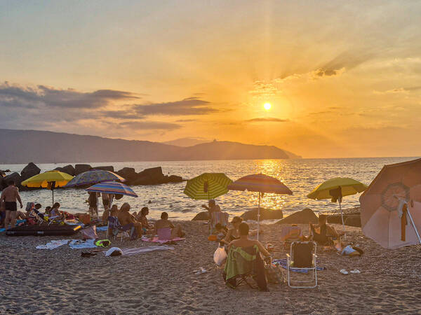 On the beach in Sicily in July